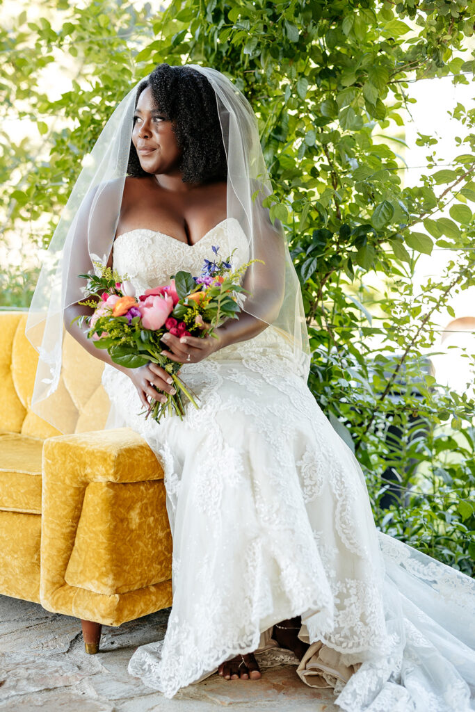 Bride posed in the garden wedding venue