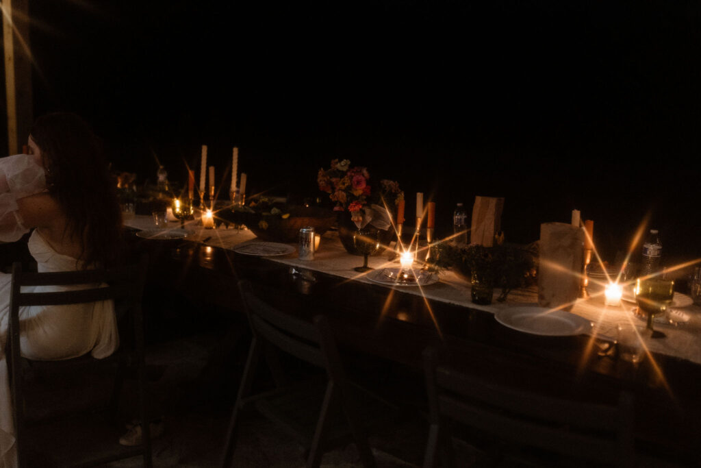 wedding reception lit by candlelight