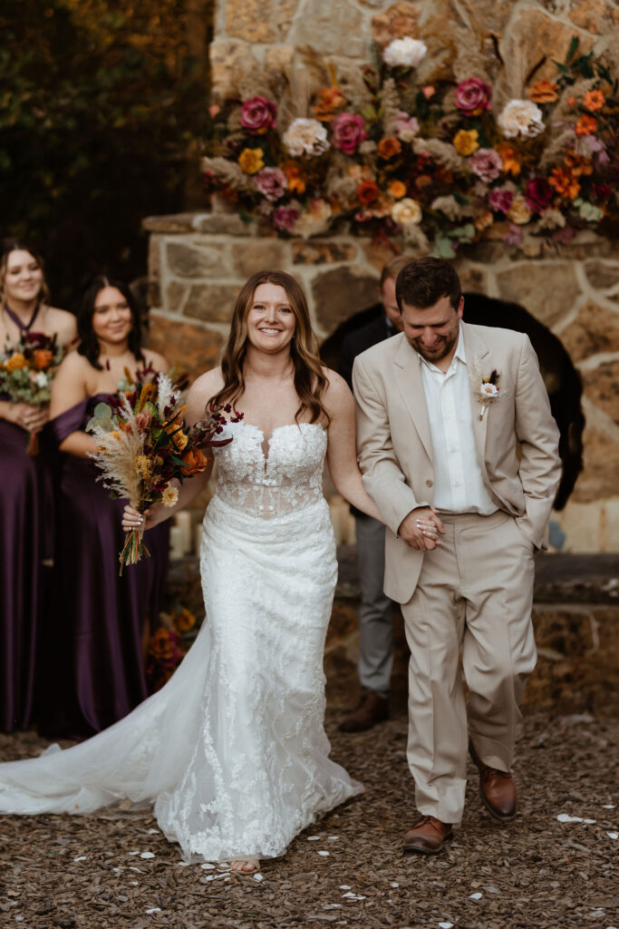 boho wedding ceremony with flowers and lace